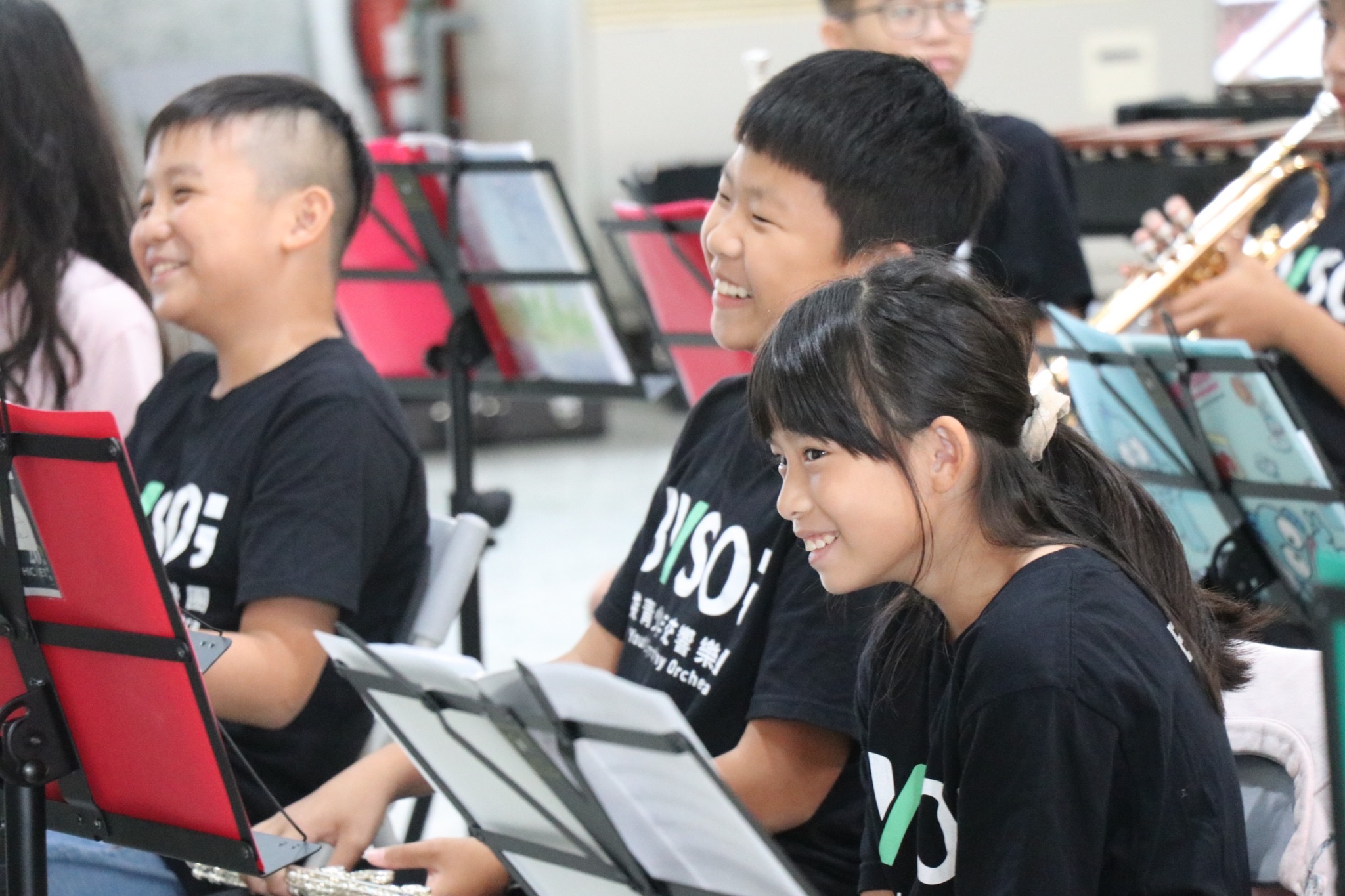 布袋青少年交響樂團(BYSO)排練時開心投入的模樣。圖/台灣科藝文教協會提供
